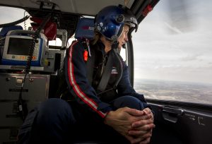 Flight nurse Raenelle Hamilton looks out the window of Memorial's medlight helicopter as it travels from South Bend to Elkhart, Monday, April 11, 2016 in South Bend. Tribune photo/BECKY MALEWITZ